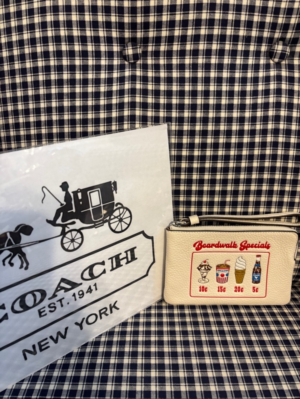 Coach Cream corner zip Wristlet with Red Graphic Boardwalk Motif